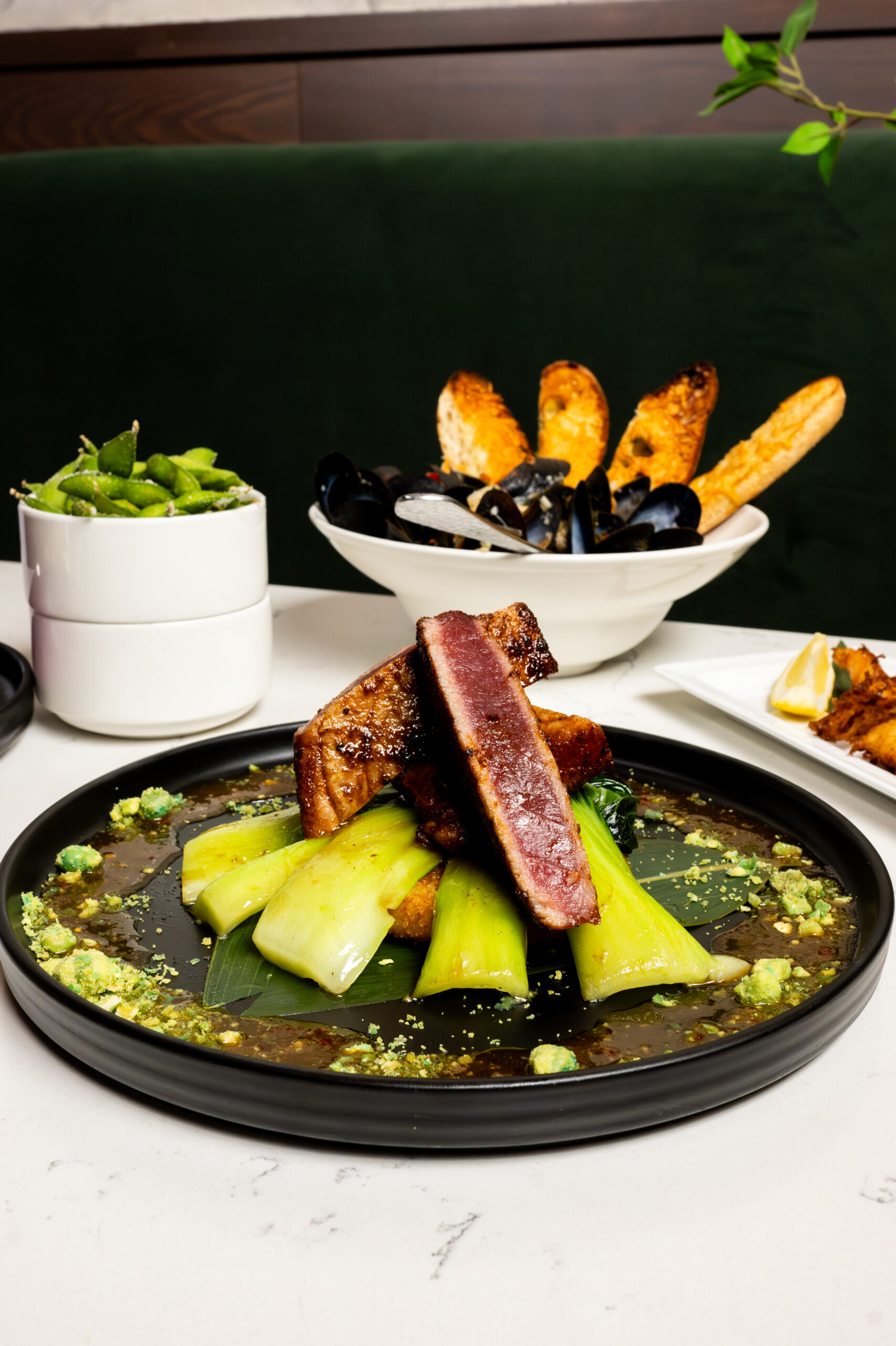 Ahi Tuna, Mussels, Edamame Relax with exquisite cuisine in a serene unique restaurants near me setting.